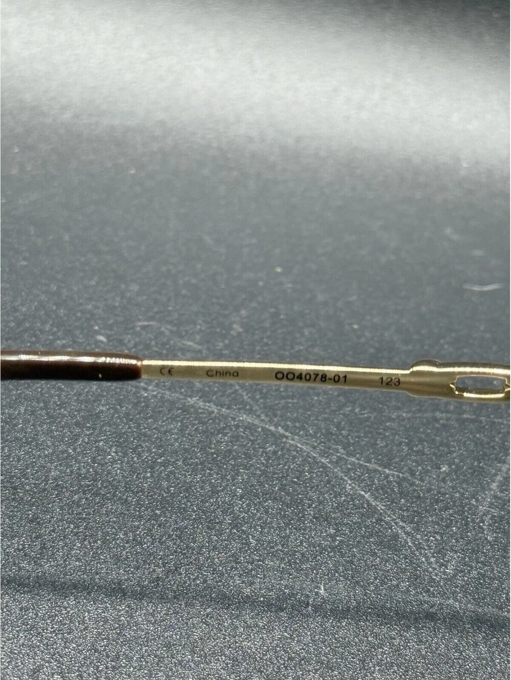 Oakley Collected Polished Gold/Tungsten Iridium Lenses OO4078-01